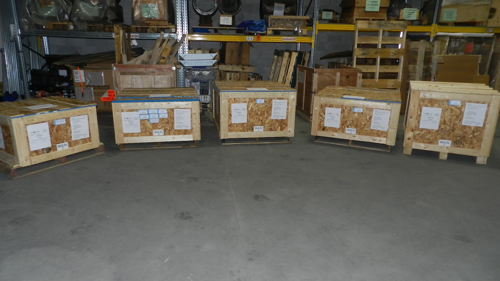 Custom wooden shipping crates labelled and staged for export