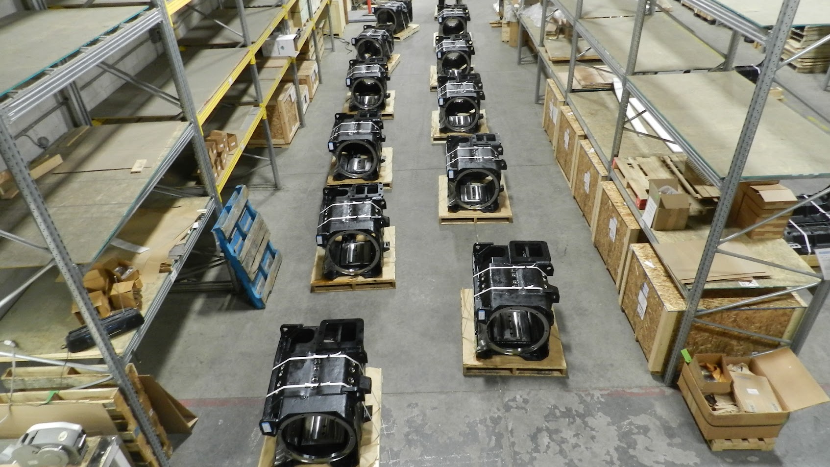 Overhead view — rows of traction motors lined up for inspection
